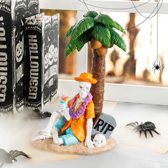 Glitzhome® 11.5" Halloween Polyresin Skeleton on Beach Table Decor